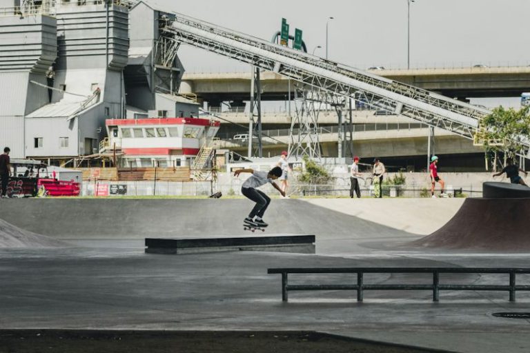 Community Sports - man skateboarding on gray concrete ramp