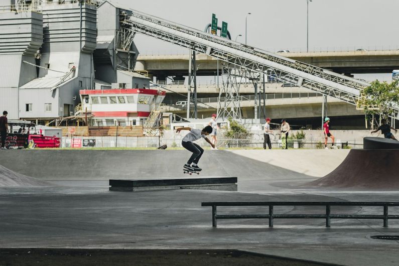 Community Sports - man skateboarding on gray concrete ramp