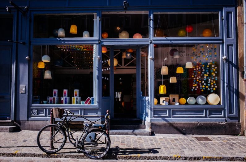 Local Shop - black trike parked near soter