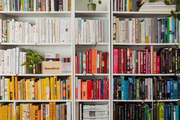 Library Books - books on white wooden shelf